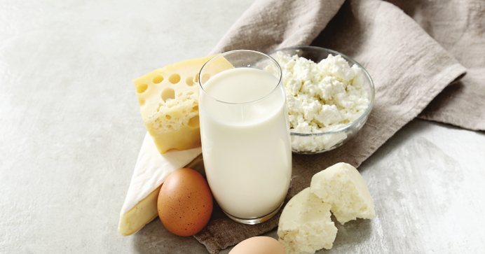 Glass of milk with cheese, paneer and eggs